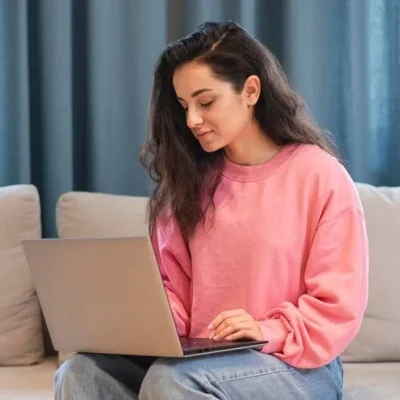 young-woman-working-laptop-home_23-2148538929-e1703099728526